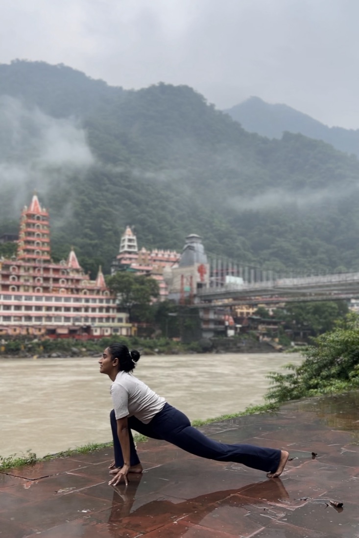 Lunge on a wet ghat on a misty morning